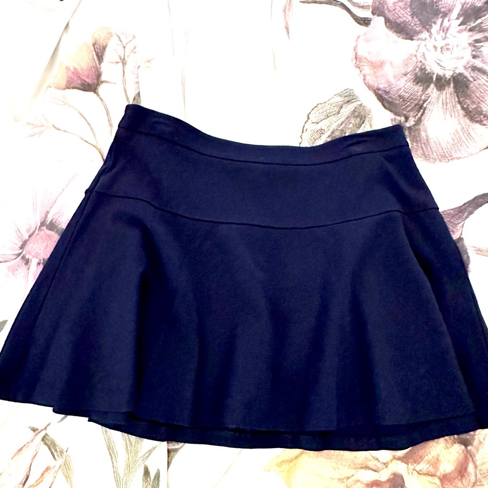 Navy blue miniskirt, flares out. Banana Republic  Sz 12